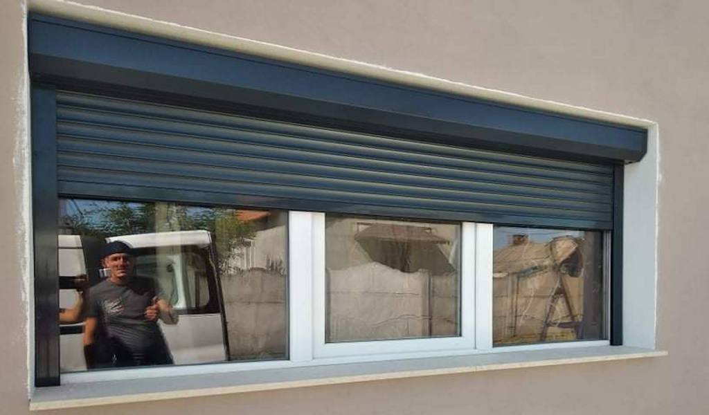 house installation of double glazed windows with roller